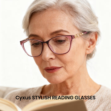 Woman wearing stylish reading glasses with a blurred background