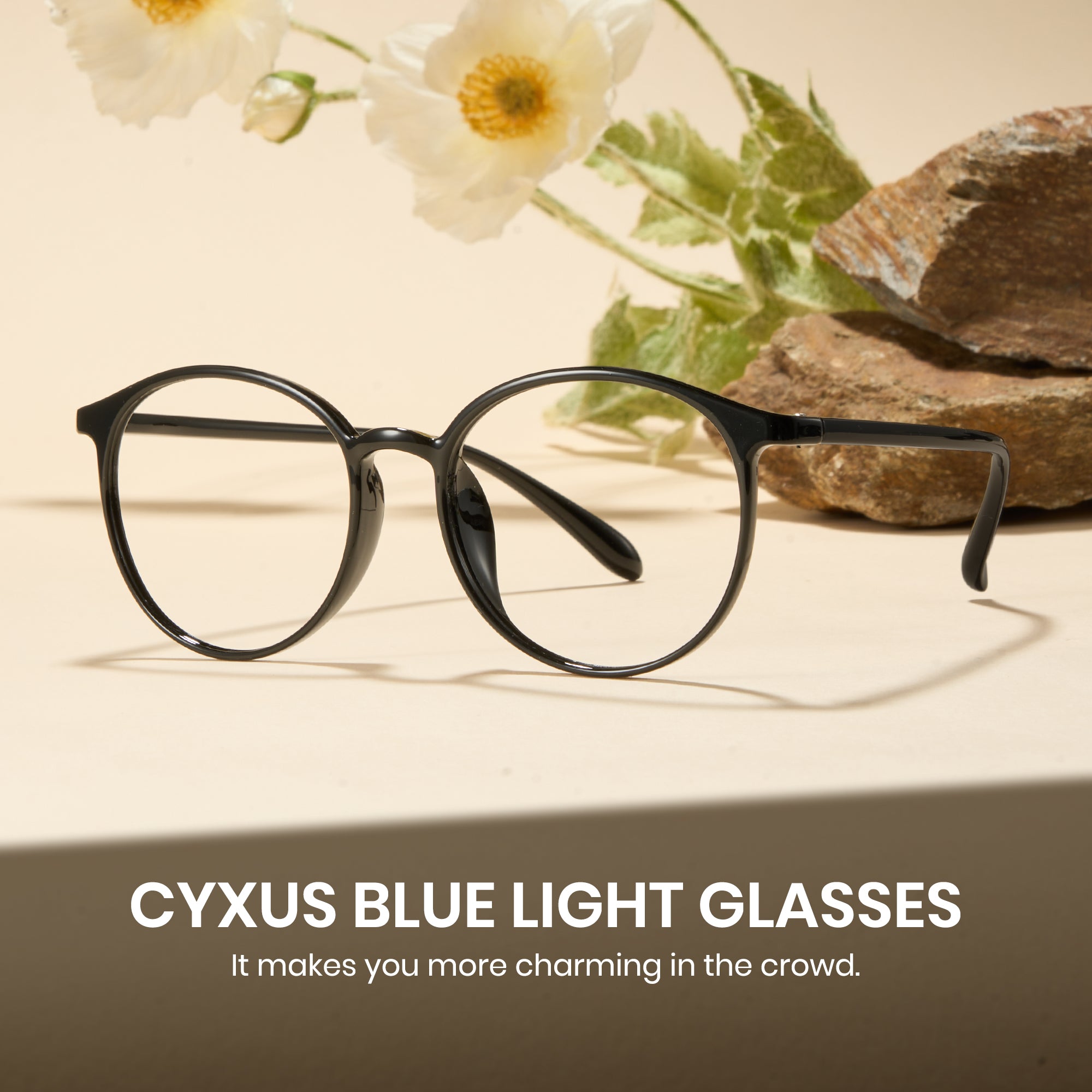 Black glasses with floral and stone background, featuring CYXUS Blue Light Glasses text.