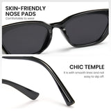 Black sunglasses with text highlighting skin-friendly nose pads and chic temple design on a white background.