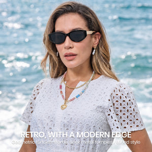 Black frame grey lens retro oval sunglasses on woman face, vintage non-polarized shades