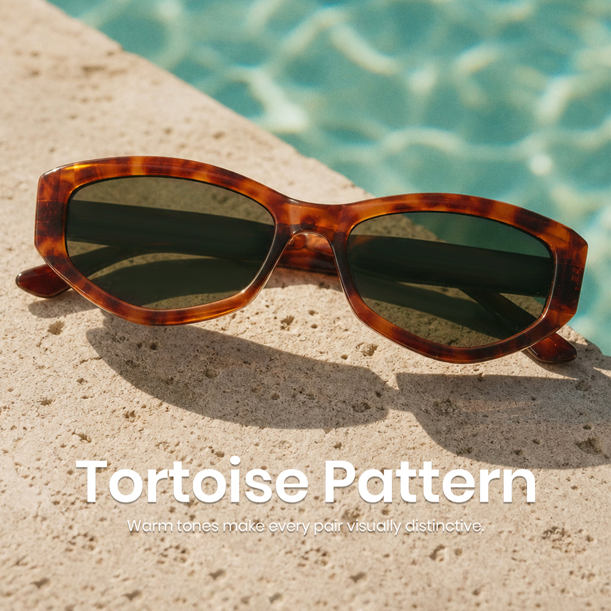 Tortoise patterned sunglasses with dark green lenses resting on a sandy surface next to a swimming pool, with the text 'Tortoise Pattern' overlaid at the bottom.