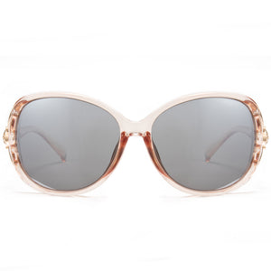 The lenses are polarized, enhancing visual clarity and reducing glare, making them both stylish and functional.