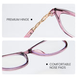 Close-up of pink eyeglasses with gold hinge and text highlighting premium hinge and comfortable nose pads on a white background.