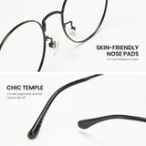 Black eyeglasses with text highlighting skin-friendly nose pads and chic temple design on a white background.