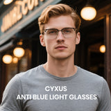 Man wearing glasses with 'CYXUS Anti Blue Light Glasses' text in front of a blurred store exterior.