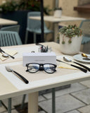 Cyxus smart glasses 8284 on a table with a 'Smart Glasses' box in an outdoor setting