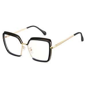 Glossy black oversized photochromic blue light glasses, gold metal temples, white to tea lens