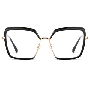 Glossy black oversized photochromic blue light glasses, gold metal temples, white to tea lens