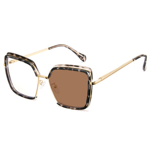 Tortoise oversized photochromic eyewear, gold metal arms, blue light blocking square frame