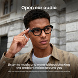 Man wearing Cyxus smart glasses with text about open ear audio technology