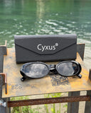 Cyxus sunglasses and case on a metal surface with a blurred natural background